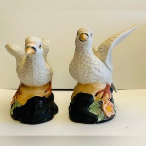Vintage doves, porcelain. White on black base with flowers. Set of 2.